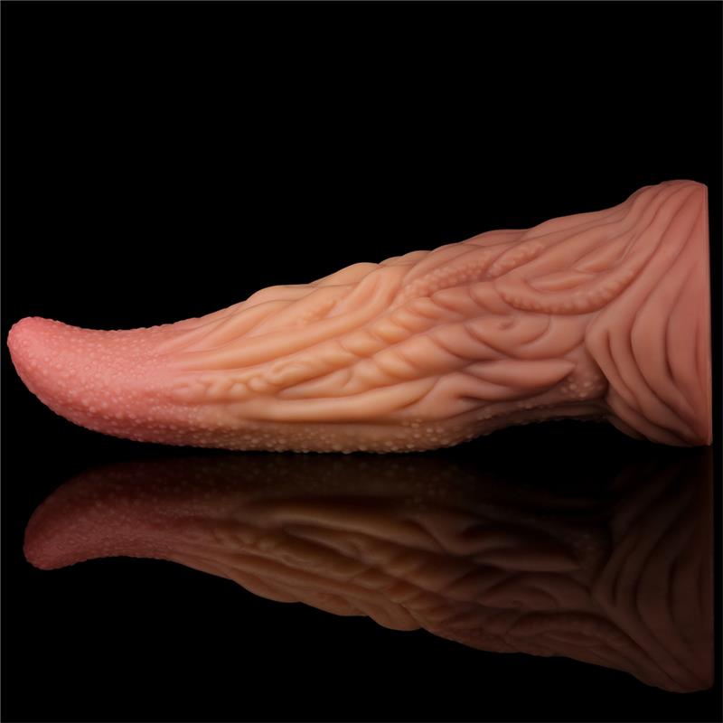 Dildo langue alien 25 cm de la marque LoveToy, vue de profil allongé sur une surface