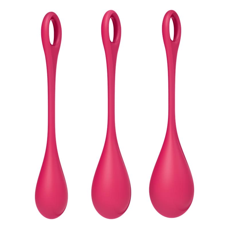Gros plan sur les boules de geisha Yoni Power 1 rouges, avec le logo Satisfyer visible sur chaque pièce.
