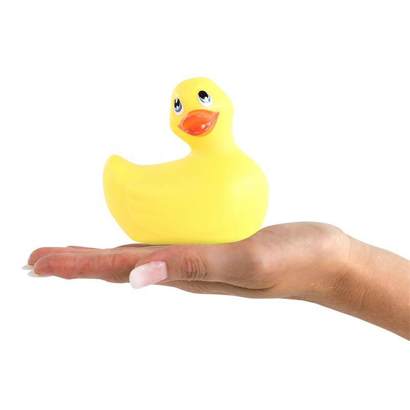 Vibromasseur canard jaune posée sur une main